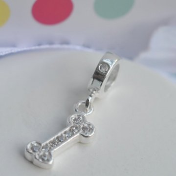 Berloque Osso Cravejado - Prata