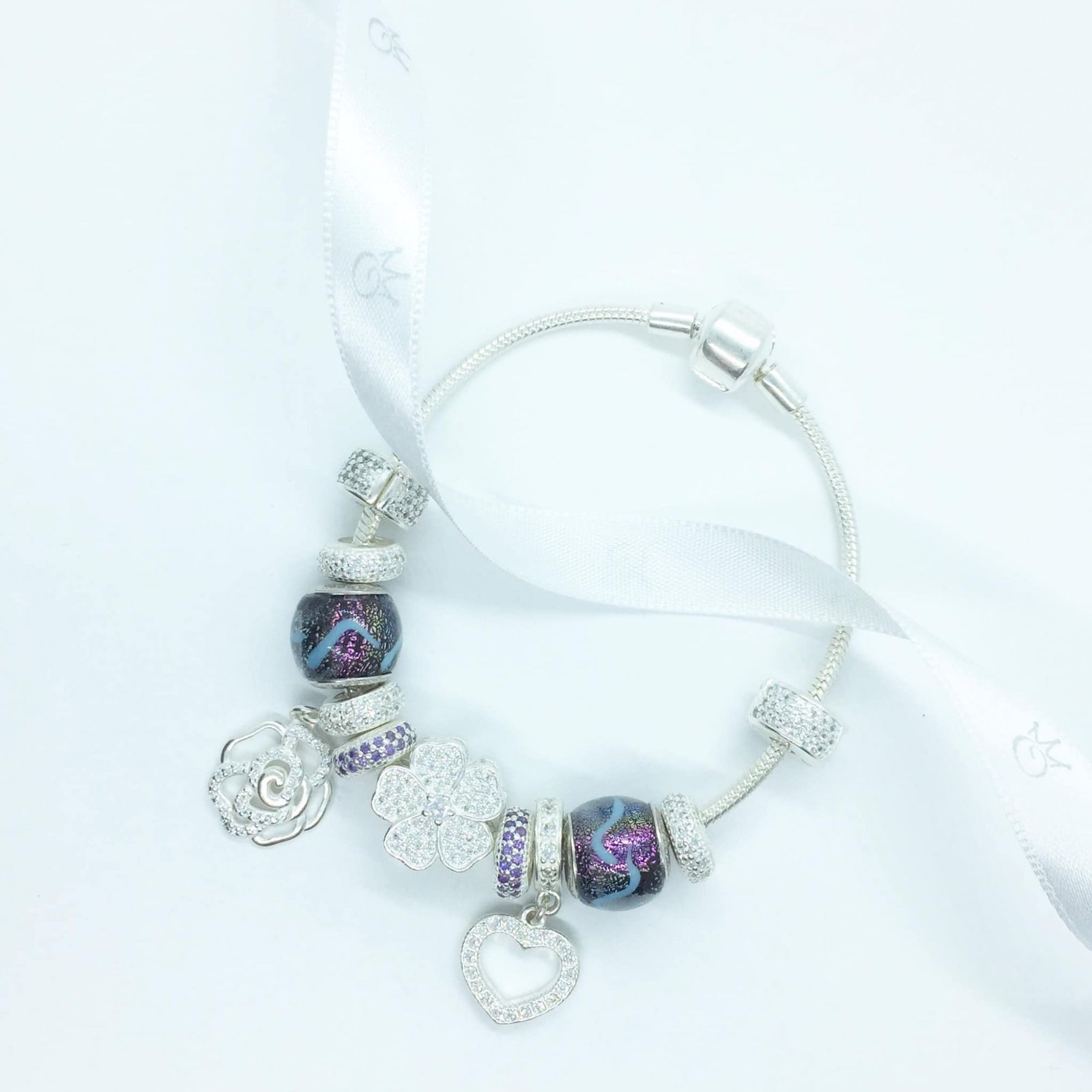 Berloque Flor Cravejada Vazada - Prata Berloque Flor Cravejada Vazada - Prata