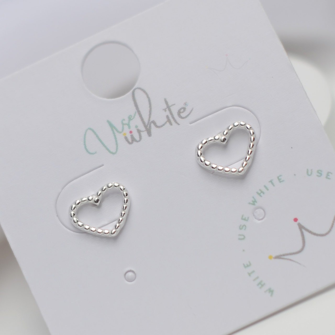 Brinco Coração Vazado Pontilhado- Prata Brinco Coração Vazado Pontilhado- Prata