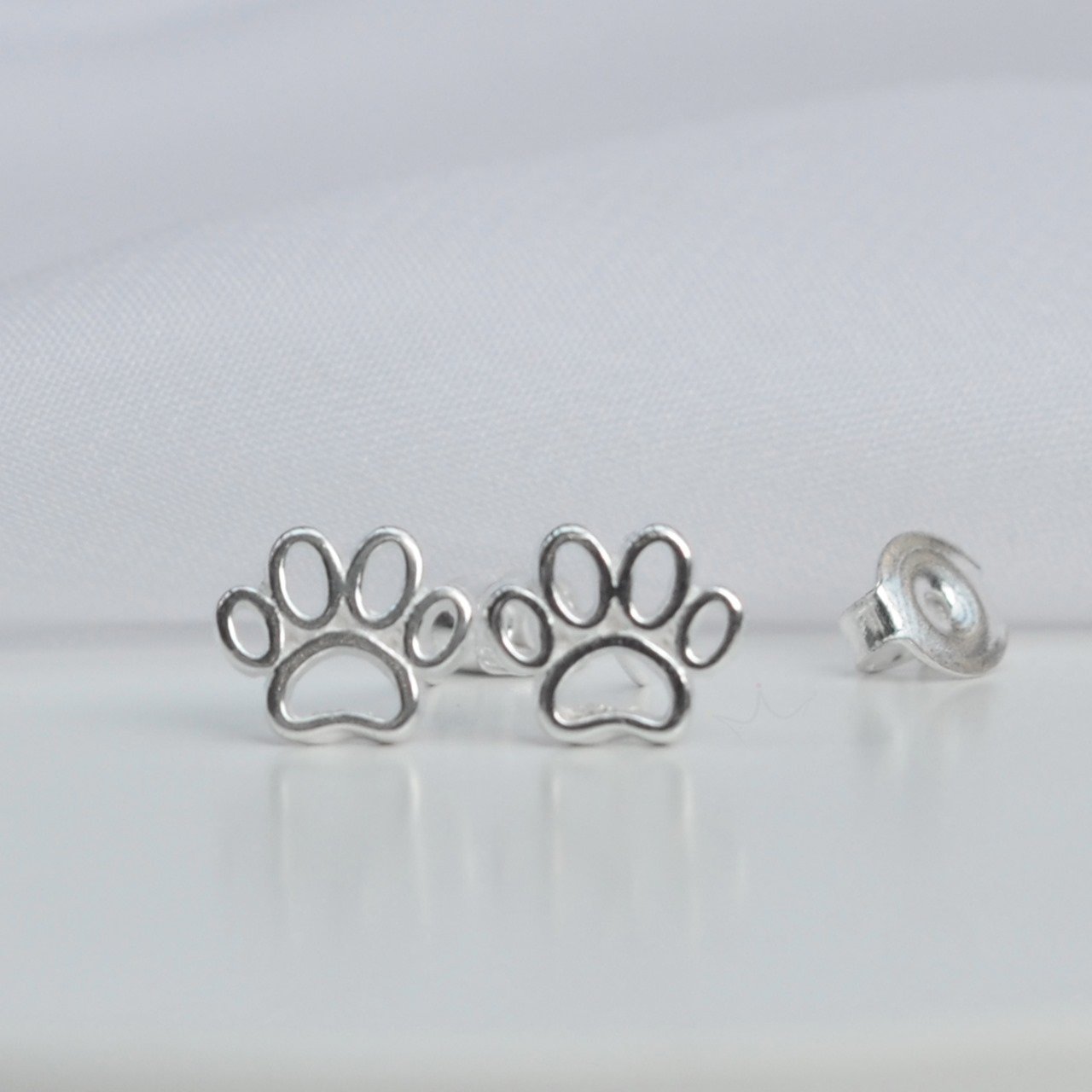 Brinco Patinha Lisa - Prata Brinco Patinha Lisa - Prata