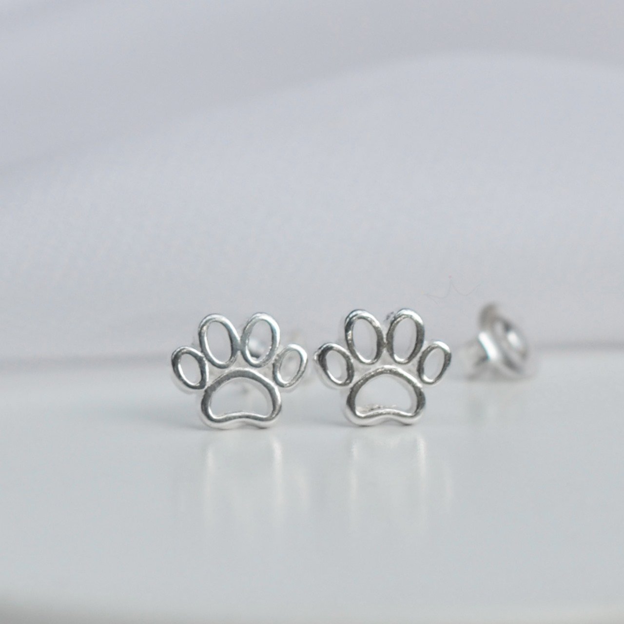 Brinco Patinha Lisa - Prata Brinco Patinha Lisa - Prata