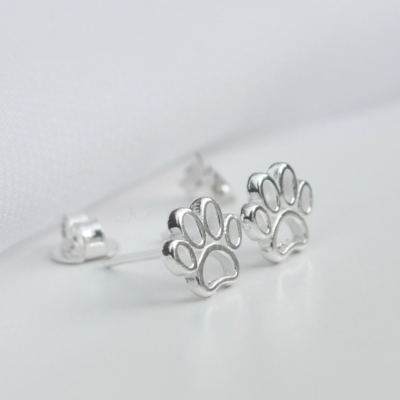 Brinco Patinha Lisa - Prata Brinco Patinha Lisa - Prata